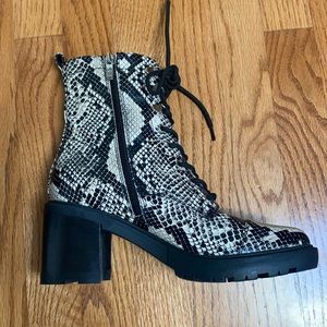 Snake skin heeled boots